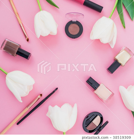Beauty composition with white tulips and cosmetics Beauty composition with white tulips and cosmetics 38519309