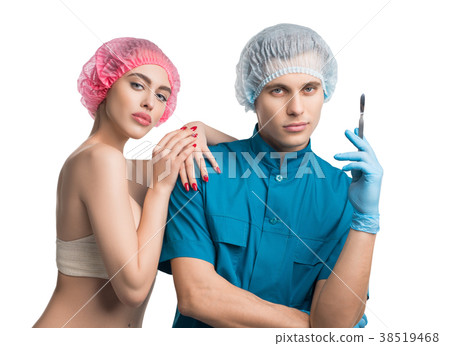 Plastic surgeon with his female pretty patient Plastic surgeon with his female pretty patient 38519468