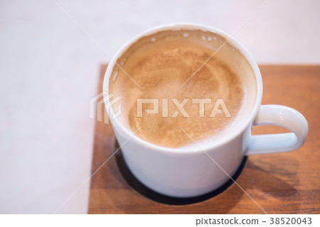 Hot Cappuccino with frothy milk foam 38520043