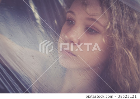 Portrait of a young sad girl. 38523121