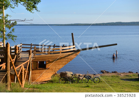 Sailing ship pavilion on the coast of lake. Sailing ship pavilion on the coast of lake. 38525928