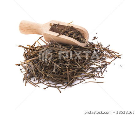 Black dry tea leaves isolated on white background 38528165
