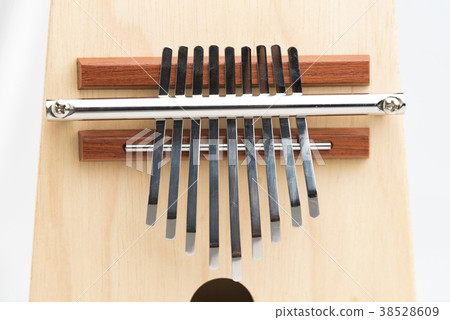 Wooden ethnic African instrument Kalimba isolated Wooden ethnic African instrument Kalimba isolated 38528609