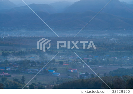 Aerial view of Pai city covered with fog 38529190