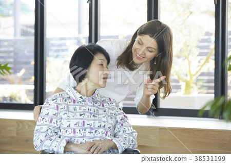 Seniors and foreigners in care Seniors and foreigners in care 38531199