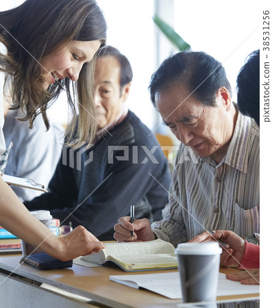 Senior attending English conversation class 38531256