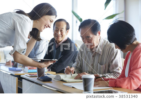 Senior attending English conversation class 38531340