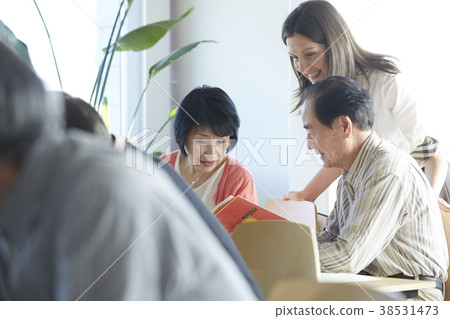 Senior attending English conversation class 38531473