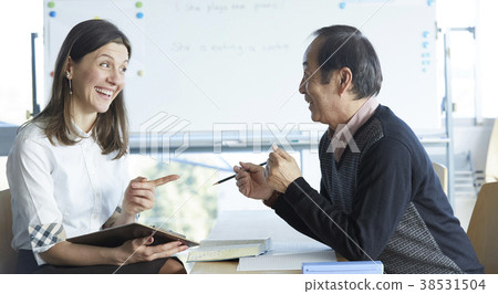 Senior attending English conversation class 38531504