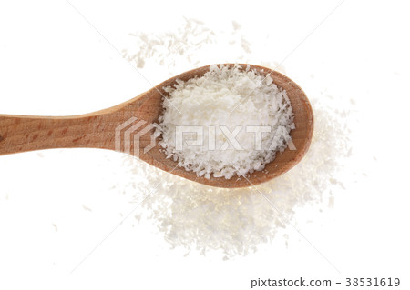 Heap of coconut flakes in wooden spoon isolated on 38531619