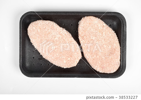 raw delicious chicken cutlet in package. Isolated raw delicious chicken cutlet in package. Isolated 38533227