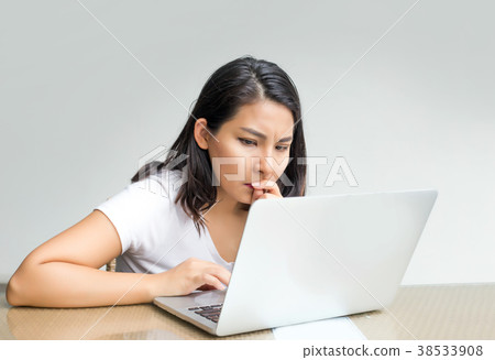asian woman use laptop and mobile in busy asian woman use laptop and mobile in busy 38533908