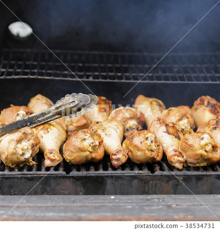 Appetizing turkey drumsticks on the grill, on 38534731