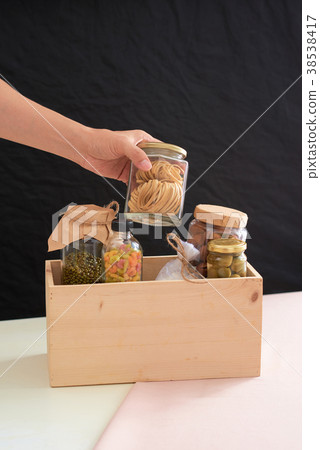 Food in a donation box for poor. Food in a donation box for poor. 38538417