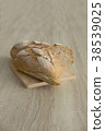 CRUSTY LOAF ON CHOPPED BOARD VERTICAL 38539025