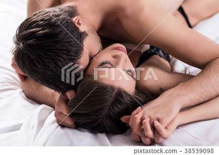 Foto de Sensual couple in love. Passion touch. Sensual mans and womans body  in hugs. Passion and sensual touch. do Stock