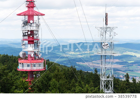 Two telecommunication towers communication 38539778
