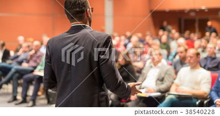 Public speaker giving talk at Business Event. Public speaker giving talk at Business Event. 38540228