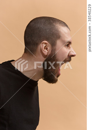 The young emotional angry man screaming on pastel 38540229