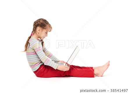Girl sitting with laptop Girl sitting with laptop 38541497