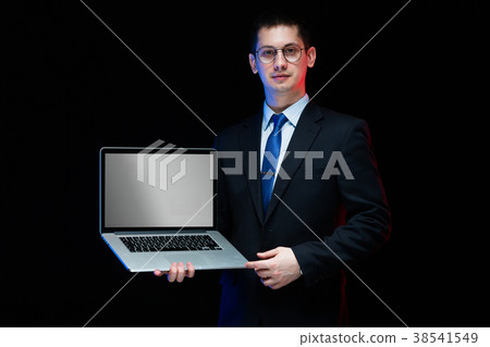 Portrait of confident handsome stylish businessman 38541549