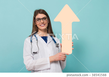 Female doctor with paper pointer Female doctor with paper pointer 38541588