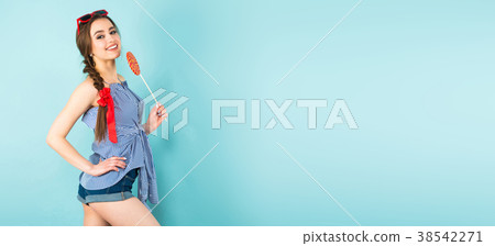 Young sexy woman with lollipop Young sexy woman with lollipop 38542271
