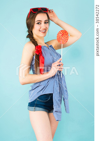 Young sexy woman with lollipop Young sexy woman with lollipop 38542272