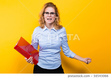 Angry woman with big folder 38543066