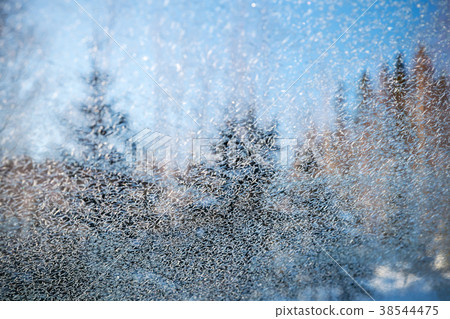 Window frost. Ice crystals on frozen glass 38544475