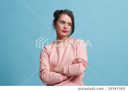 Beautiful bored woman bored isolated on blue 38545360