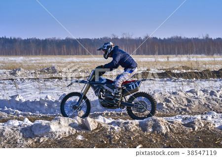 Sportsman racer man fulfills a fast ride Sportsman racer man fulfills a fast ride 38547119