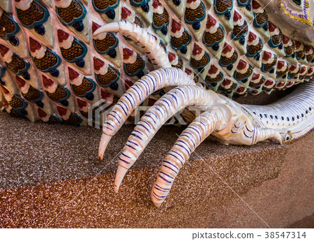 Foot of mythical creature guarding in temple. Foot of mythical creature guarding in temple. 38547314