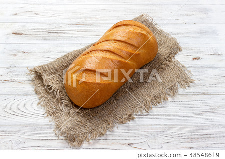 Fresh bread on wooden table. Top view Fresh bread on wooden table. Top view 38548619