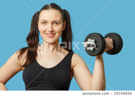 woman with dumbbell woman with dumbbell 38549898