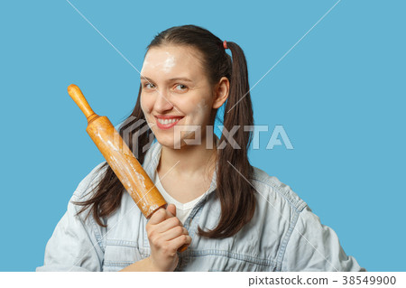 woman with rolling pin woman with rolling pin 38549900