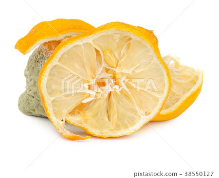 Rotten and dry lemon isolated on white 38550127