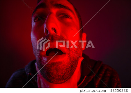 Depressed stressed man strangling himself 38550288