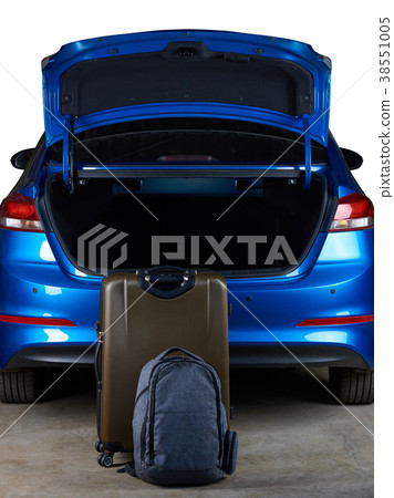 Luggage bags stand next to open car trunk Luggage bags stand next to open car trunk 38551005