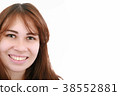Pretty young woman smiling - copyspace 38552881