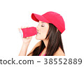 a woman drinking by aluminum 38552889