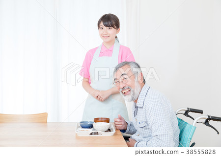 Young carer and grandpa enjoy meal conversation assistance nutrition management nursing home day care center Young carer and grandpa enjoy meal conversation assistance nutrition management nursing home day care center 38555828
