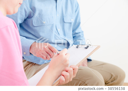Nursing care health check interview young nurse and grandpa nursing home day care center wheelchair Nursing care health check interview young nurse and grandpa nursing home day care center wheelchair 38556138