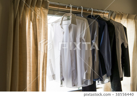 Laundry by the window of a man's living alone Laundry by the window of a man's living alone 38556440