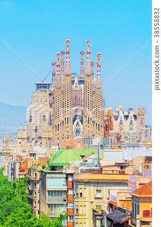 Basilica of La Sagrada Familia against blue sky. Basilica of La Sagrada Familia against blue sky. 38558832