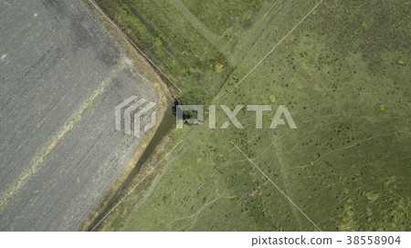 Country agricultural and farming field. Country agricultural and farming field. 38558904