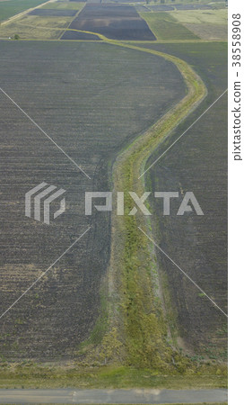 Country agricultural and farming field. Country agricultural and farming field. 38558908