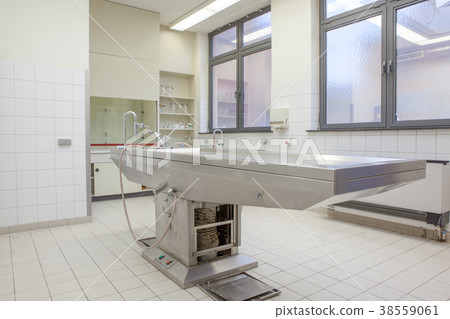 Autopsy tables in morgue 38559061