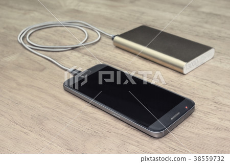 Smartphone charging with power bank  38559732