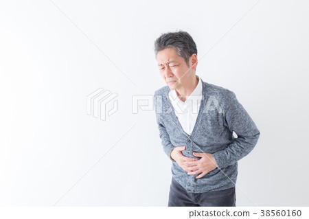 Senior man stomachache 38560160